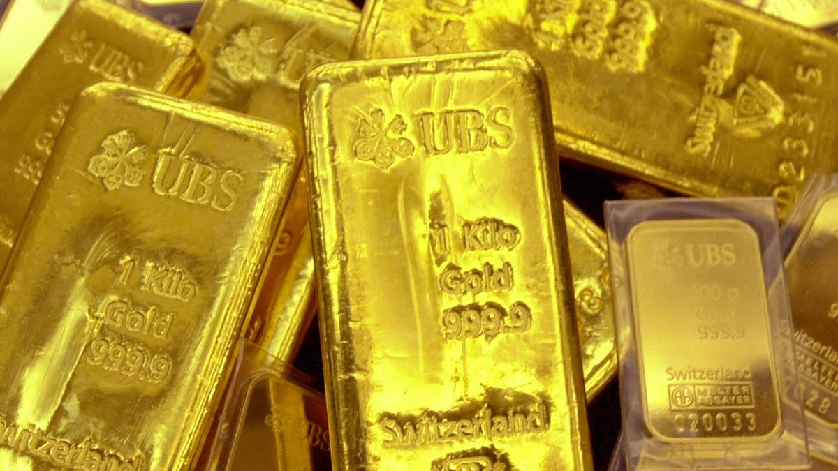 Top bank revises 2026 gold price forecast as investors reassess rally